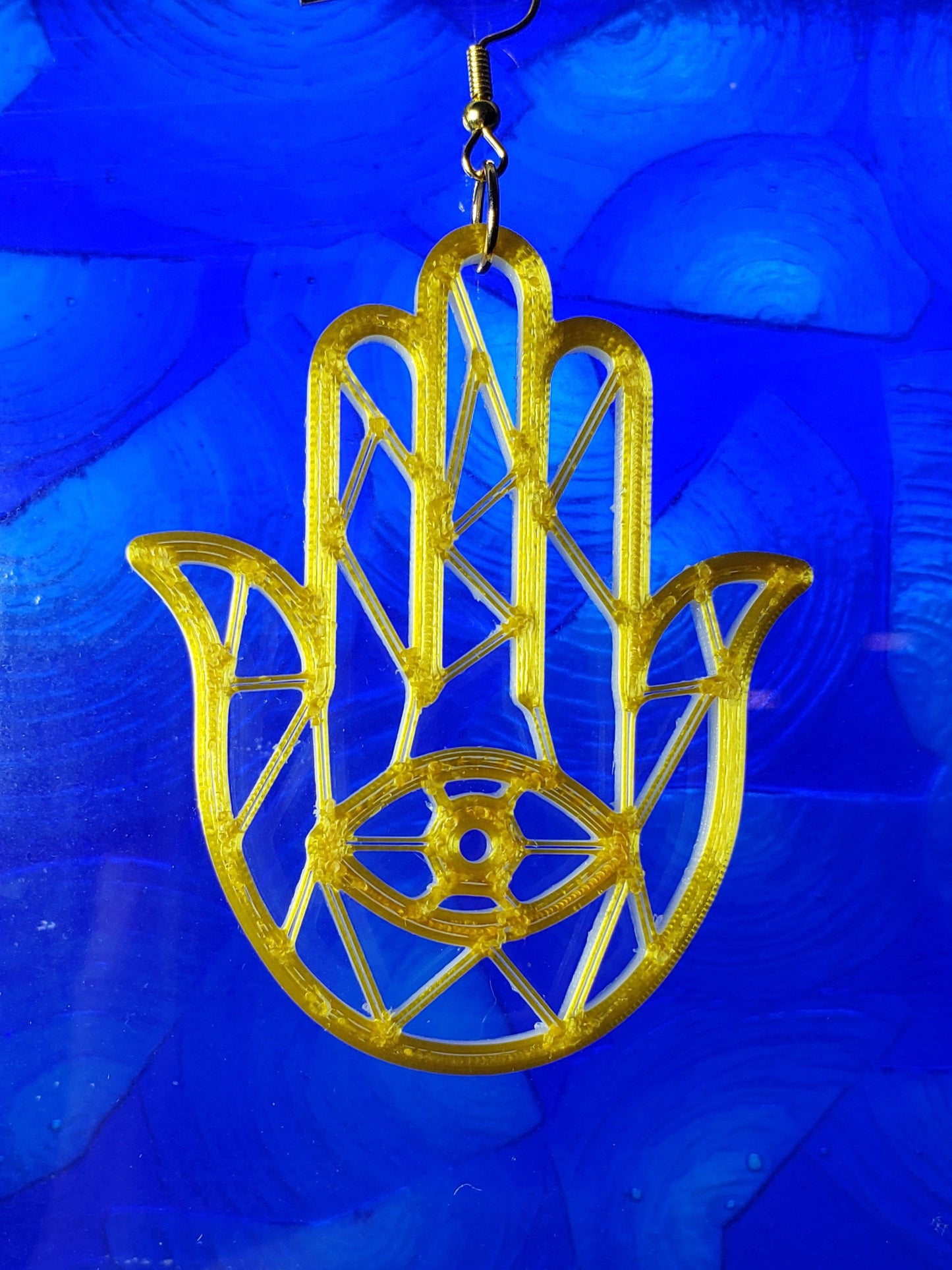 Glow & Gold 3rd eye Hamsa hand dangles